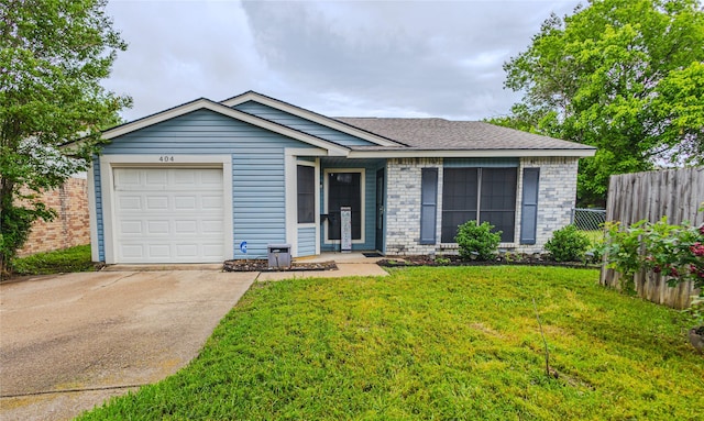 404 Jones St, Cedar Hill, TX 75104 - single story home with an attached garage, driveway, and brick siding