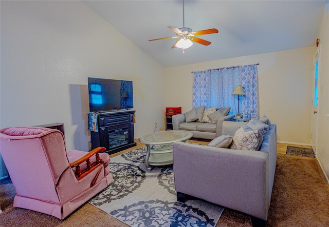 404 Jones St, Cedar Hill, TX 75104 - carpeted living area featuring a ceiling fan, a glass covered fireplace, high vaulted ceiling, and baseboards
