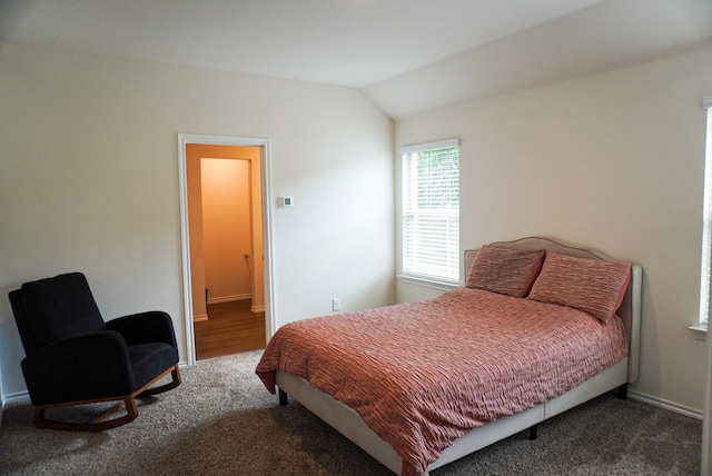 3128 Bettin Dr, Mesquite, TX 75126 - carpeted bedroom featuring vaulted ceiling and baseboards