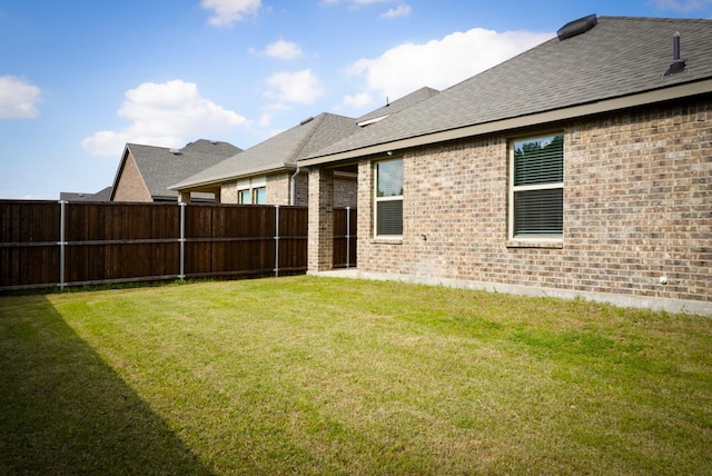 3128 Bettin Dr, Mesquite, TX 75126 - rear view of property featuring roof with shingles and brick siding