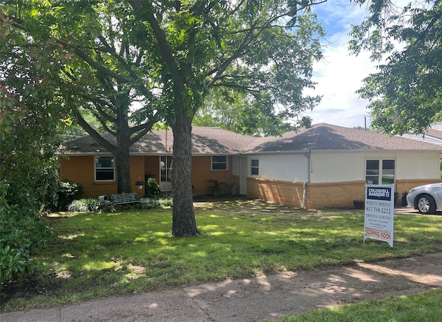 1224 Bellaire Dr, Grapevine, TX 76051 - view of front of property featuring a front yard, brick siding, and a shingled roof