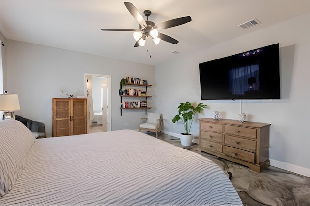 1061 N Whitt Rd, Perrin, TX 76486 - bedroom featuring baseboards, a ceiling fan, and connected bathroom