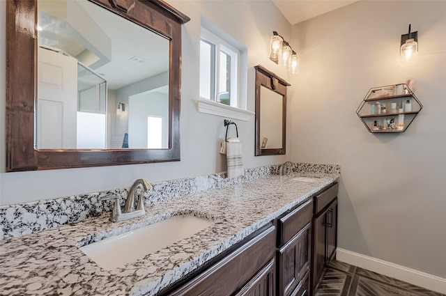 1061 N Whitt Rd, Perrin, TX 76486 - bathroom with baseboards and double vanity