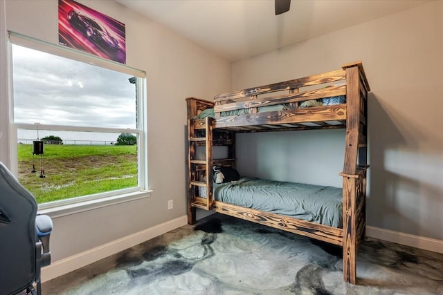 1061 N Whitt Rd, Perrin, TX 76486 - bedroom featuring baseboards and a ceiling fan