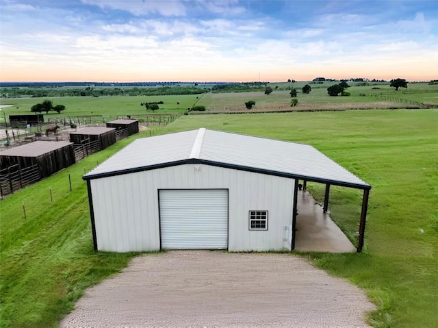 1061 N Whitt Rd, Perrin, TX 76486 - detached garage with a view of rural / pastoral area and driveway