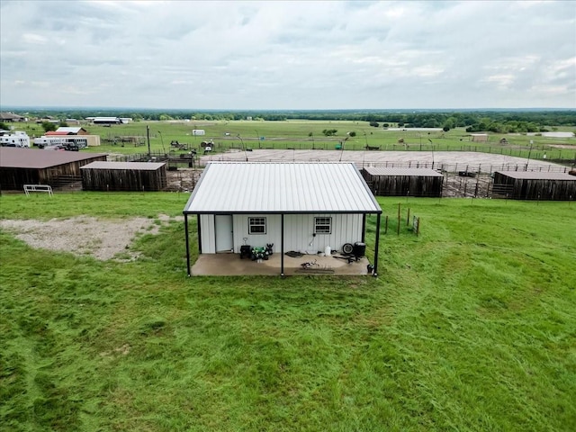 1061 N Whitt Rd, Perrin, TX 76486 - view of outdoor structure featuring a view of countryside and an outbuilding