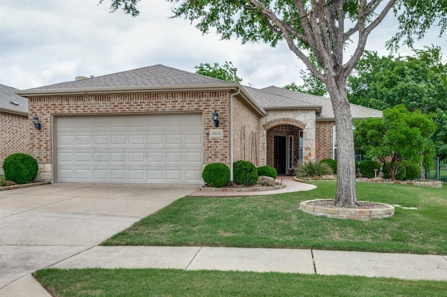 1628 Overwood Dr, Frisco, TX 75036 - view of front of property with brick siding, concrete driveway, a front yard, and a garage
