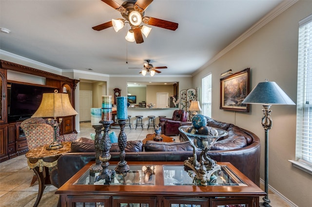 1628 Overwood Dr, Frisco, TX 75036 - living room featuring ceiling fan, healthy amount of natural light, ornamental molding, baseboards, and light tile patterned floors