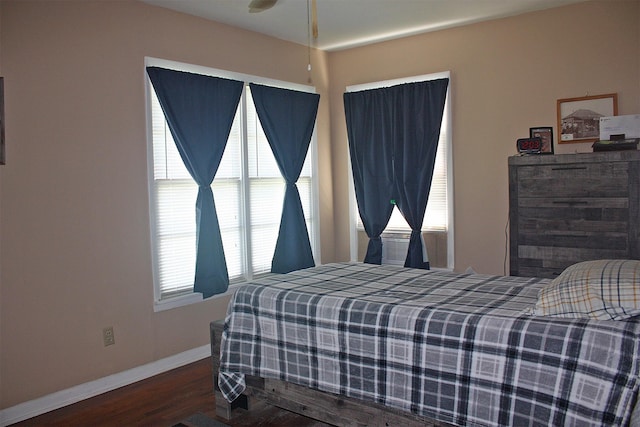 205 N Texas St, Whitney, TX 76692 - bedroom featuring wood finished floors and baseboards