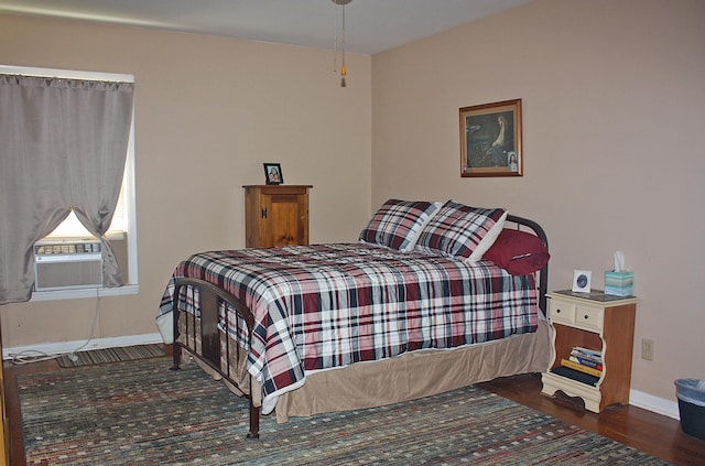 205 N Texas St, Whitney, TX 76692 - bedroom featuring wood finished floors and baseboards