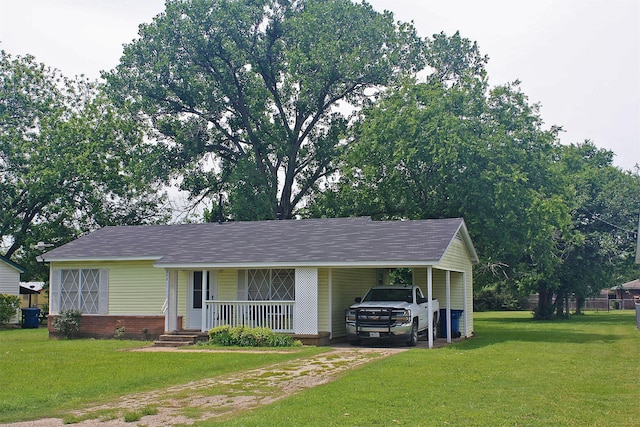 205 N Texas St, Whitney, TX 76692 - ranch-style home featuring a front lawn, a porch, driveway, and a carport