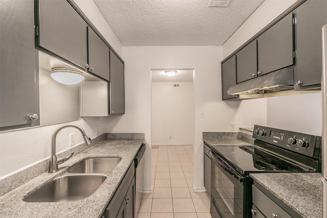 6188 Vega Dr, Fort Worth, TX 76133 - kitchen with black / electric stove, under cabinet range hood, a sink, light tile patterned flooring, and a textured ceiling
