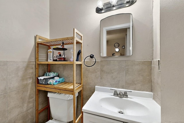 2422 Sue Cir, Mesquite, TX 75149 - bathroom featuring tile walls and vanity