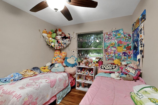 2422 Sue Cir, Mesquite, TX 75149 - bedroom featuring wood finished floors and a ceiling fan