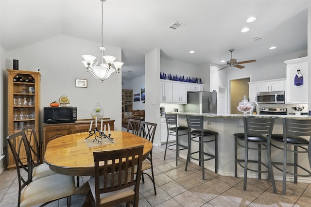 1233 Fox Hunt Trl, Willow Park, TX 76087 - dining area with a ceiling fan, lofted ceiling, light tile patterned floors, a chandelier, and recessed lighting