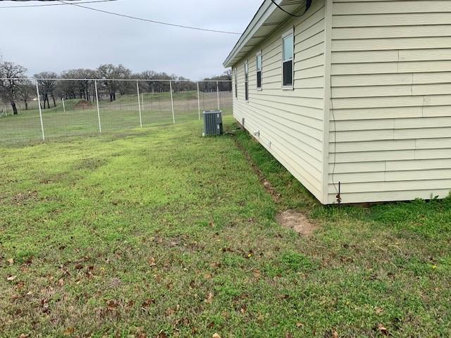 222 County Road 2195, Decatur, TX 76234 - view of yard featuring cooling unit