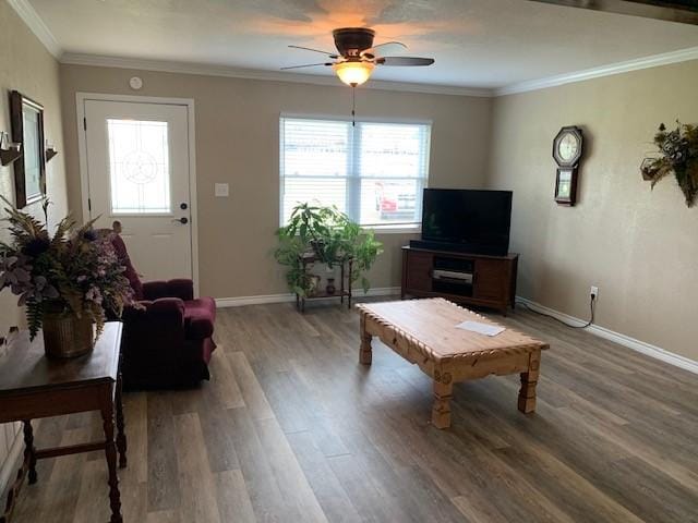 222 County Road 2195, Decatur, TX 76234 - living room featuring ceiling fan, wood finished floors, crown molding, and baseboards
