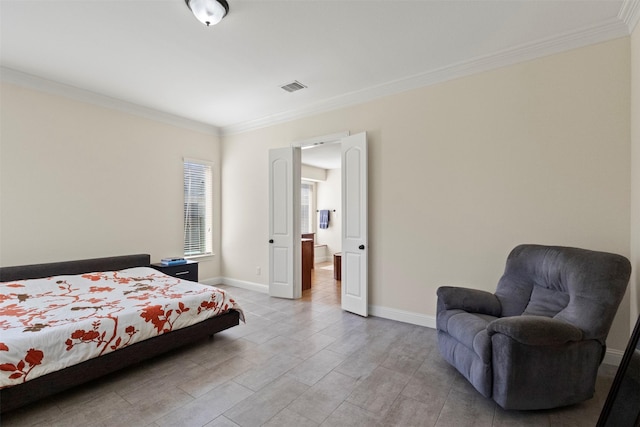 bedroom with crown molding, baseboards, and light wood finished floors