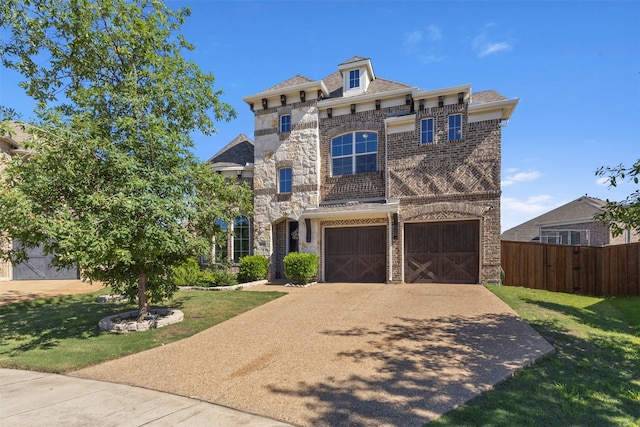 view of front of home with a garage, driveway, stone siding, and brick siding