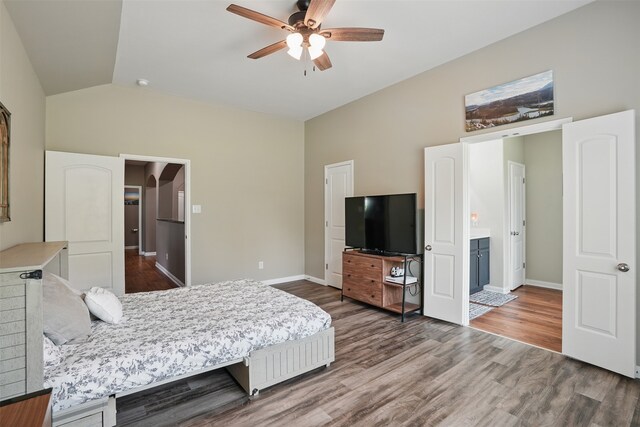 1844 Sweet Gum Dr, Anna, TX 75409 - bedroom featuring baseboards, wood finished floors, arched walkways, high vaulted ceiling, and a ceiling fan