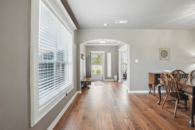 1844 Sweet Gum Dr, Anna, TX 75409 - entryway with arched walkways, hardwood / wood-style flooring, ornamental molding, and baseboards
