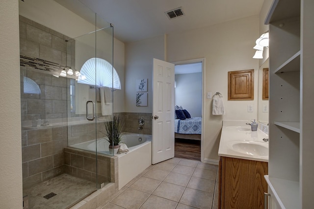 1300 Shelby Ct, Wylie, TX 75098 - ensuite bathroom with tile patterned flooring, a stall shower, a garden tub, and double vanity