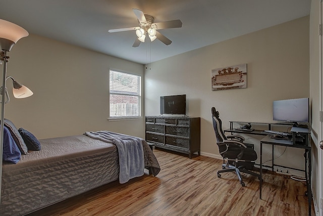 1300 Shelby Ct, Wylie, TX 75098 - bedroom featuring wood finished floors, an office area, baseboards, and ceiling fan