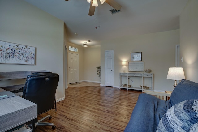 1300 Shelby Ct, Wylie, TX 75098 - office area featuring a ceiling fan, wood finished floors, and baseboards