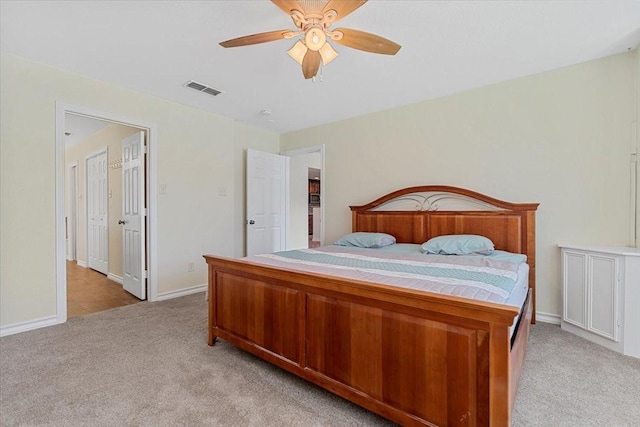 1717 Adams Ln, Azle, TX 76020 - bedroom featuring light colored carpet, a ceiling fan, and baseboards
