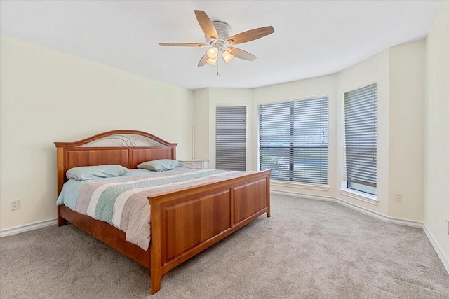 1717 Adams Ln, Azle, TX 76020 - bedroom featuring light carpet, baseboards, and a ceiling fan
