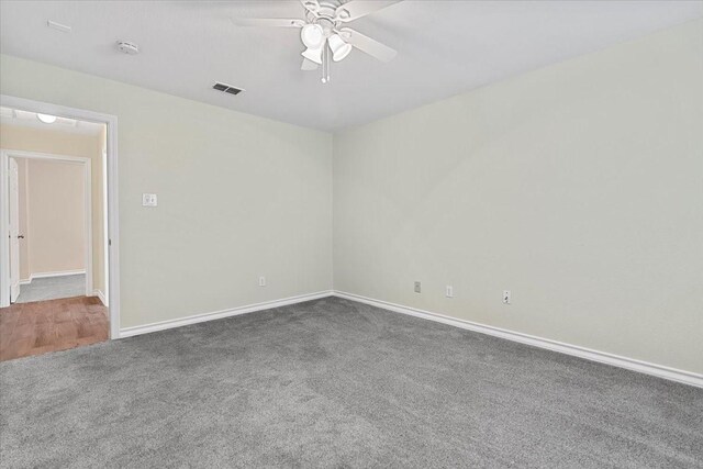 1717 Adams Ln, Azle, TX 76020 - carpeted spare room with ceiling fan, baseboards, and a smoke detector
