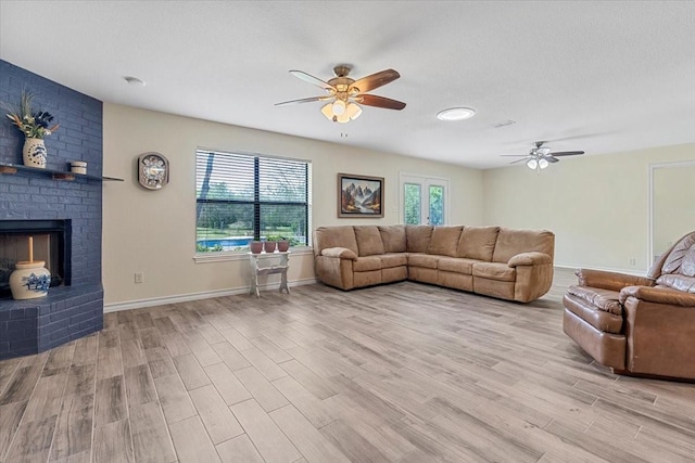 1717 Adams Ln, Azle, TX 76020 - living area with a ceiling fan, plenty of natural light, and light wood-style floors