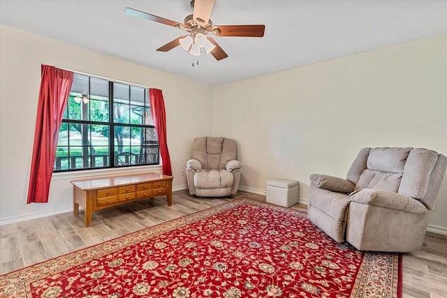 1717 Adams Ln, Azle, TX 76020 - sitting room with light wood-style flooring, baseboards, and ceiling fan