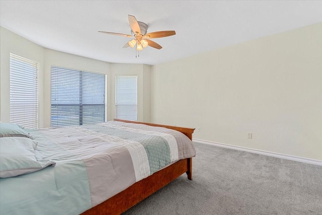1717 Adams Ln, Azle, TX 76020 - bedroom with multiple windows, carpet, baseboards, and a ceiling fan