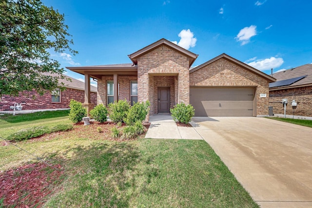 4612 Corktree Ln, Fort Worth, TX 76036 - ranch-style home with a garage, concrete driveway, a front lawn, and brick siding