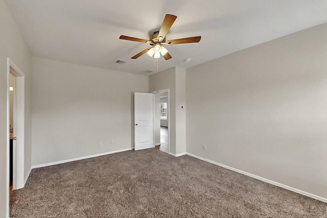 4612 Corktree Ln, Fort Worth, TX 76036 - unfurnished bedroom with dark carpet, baseboards, and ceiling fan