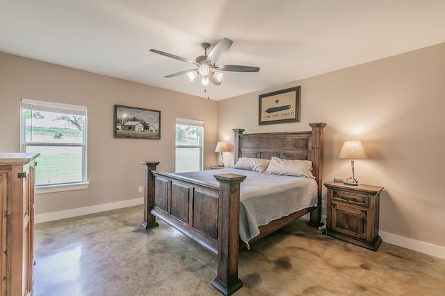505 Advance Rd, Weatherford, TX 76088 - bedroom with concrete floors, baseboards, multiple windows, and a ceiling fan