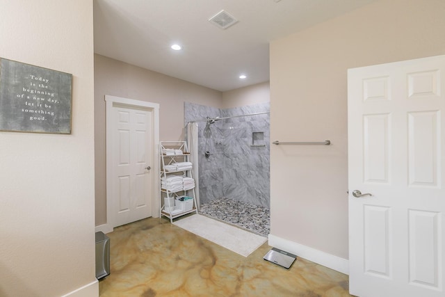 505 Advance Rd, Weatherford, TX 76088 - full bath with tiled shower, recessed lighting, baseboards, and finished concrete flooring