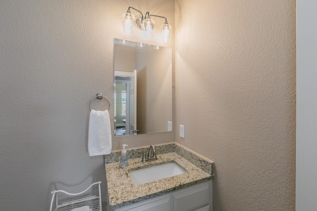 505 Advance Rd, Weatherford, TX 76088 - bathroom featuring a textured wall and vanity