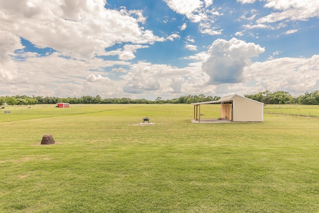 505 Advance Rd, Weatherford, TX 76088 - view of yard featuring an outdoor structure and a carport