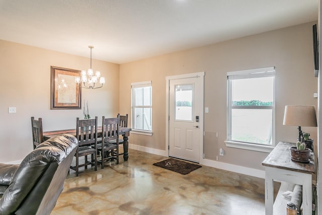 505 Advance Rd, Weatherford, TX 76088 - dining area featuring finished concrete floors, a chandelier, plenty of natural light, and baseboards