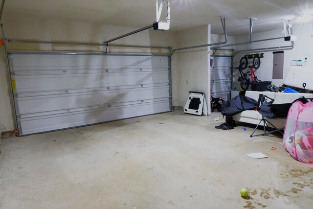 1129 Cropout Way, Fort Worth, TX 76052 - garage with a garage door opener and electric panel
