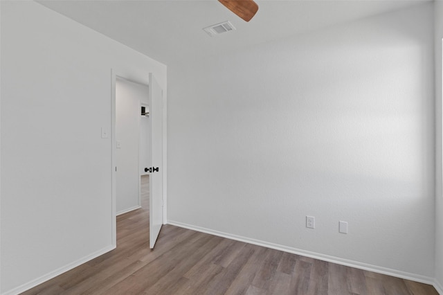 698 County Road 3825, Bridgeport, TX 76458 - unfurnished room with dark wood-type flooring, a ceiling fan, and baseboards