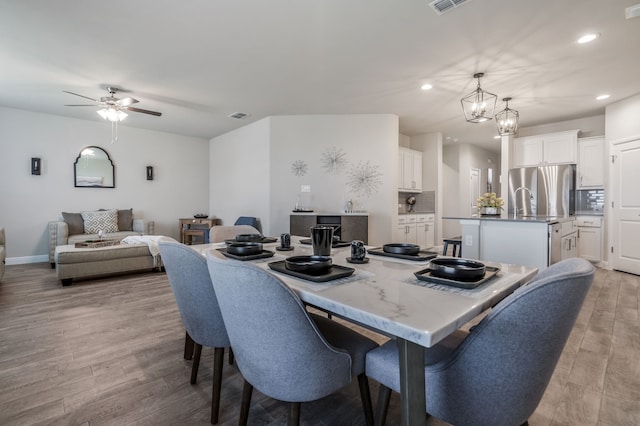 15720 Redgrave Dr, Fort Worth, TX 76247 - dining area with recessed lighting, light wood-style flooring, a ceiling fan, and baseboards