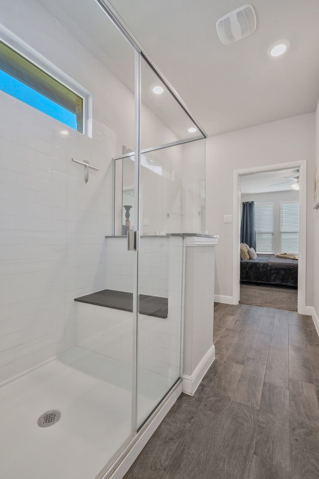 15720 Redgrave Dr, Fort Worth, TX 76247 - ensuite bathroom featuring a stall shower, baseboards, recessed lighting, and wood finished floors
