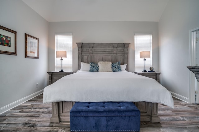 1312 Merrimac Dr, Allen, TX 75002 - bedroom with baseboards, wood finished floors, and lofted ceiling