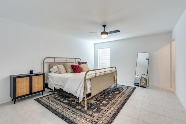 bedroom featuring light tile patterned floors and ceiling fan