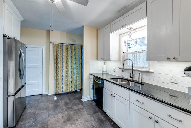 5202 Morningside Ave, Dallas, TX 75206 - kitchen featuring freestanding refrigerator, a sink, black dishwasher, dark countertops, and tasteful backsplash