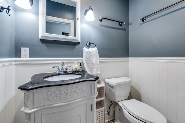 5202 Morningside Ave, Dallas, TX 75206 - bathroom with a wainscoted wall, toilet, and vanity