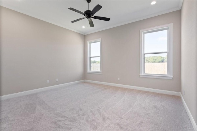 10201 Castleberry Ln, Waco, TX 76712 - spare room with ornamental molding, light colored carpet, baseboards, recessed lighting, and ceiling fan